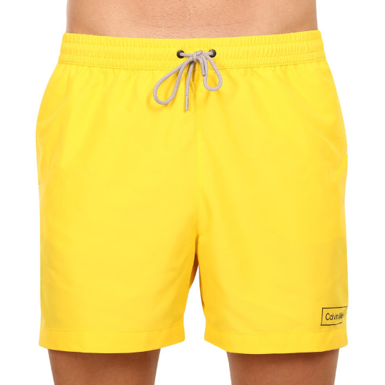 Vīriešu peldkostīmi Calvin Klein yellow (KM0KM00787 ZGR)