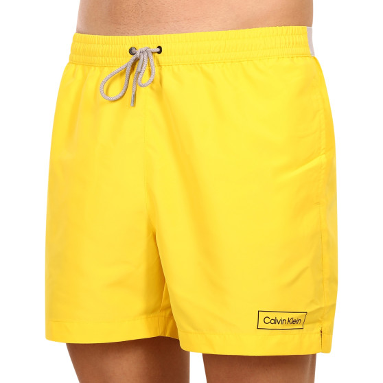 Vīriešu peldkostīmi Calvin Klein yellow (KM0KM00787 ZGR)