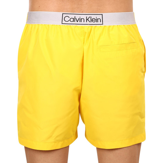 Vīriešu peldkostīmi Calvin Klein yellow (KM0KM00787 ZGR)