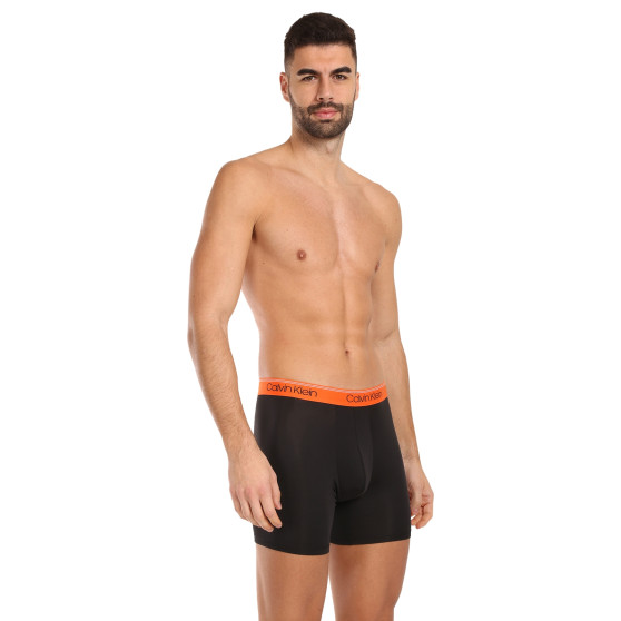 3PACK vīriešu bokseru šorti Calvin Klein melni (NB2570A-GTK)