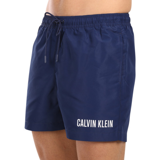 Vīriešu peldkostīmi Calvin Klein zils (KM0KM00992-C7E)