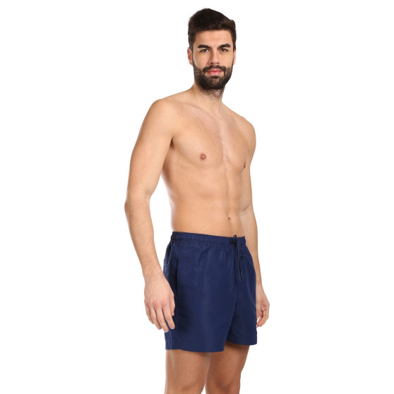 Vīriešu peldkostīmi Calvin Klein zils (KM0KM00992-C7E)