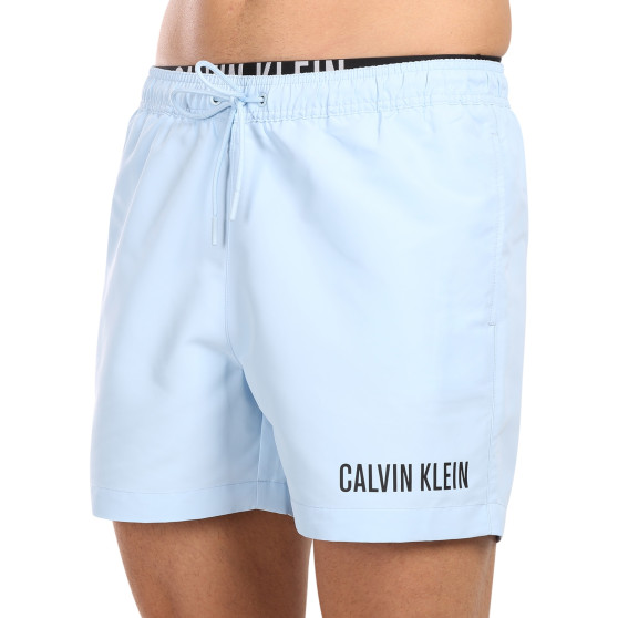 Vīriešu peldkostīmi Calvin Klein zils (KM0KM00992-C7S)