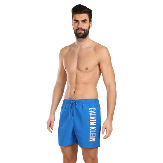 Vīriešu peldkostīmi Calvin Klein zils (KM0KM01004-DYO)