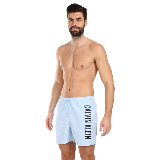 Vīriešu peldkostīmi Calvin Klein zils (KM0KM01004-C7S)