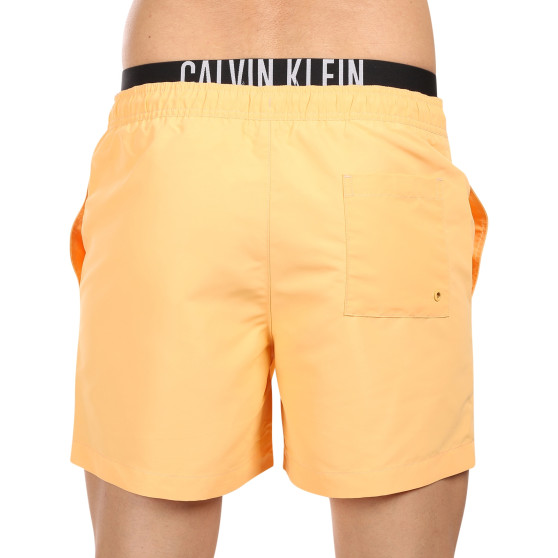 Vīriešu peldkostīmi Calvin Klein orange (KM0KM00992-SAN)