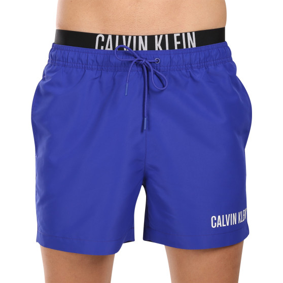 Vīriešu peldkostīmi Calvin Klein zils (KM0KM00992-C7N)