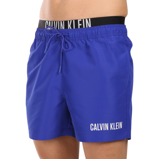 Vīriešu peldkostīmi Calvin Klein zils (KM0KM00992-C7N)