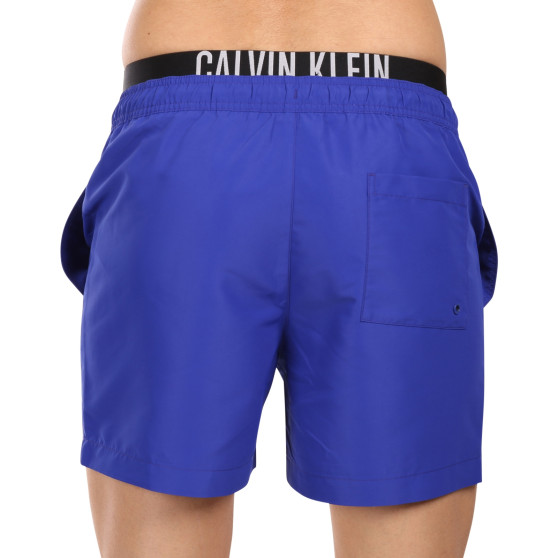 Vīriešu peldkostīmi Calvin Klein zils (KM0KM00992-C7N)