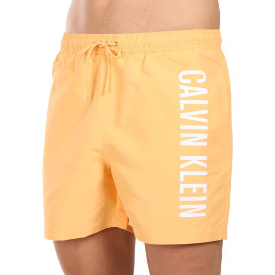 Vīriešu peldkostīmi Calvin Klein orange (KM0KM01004-SAN)